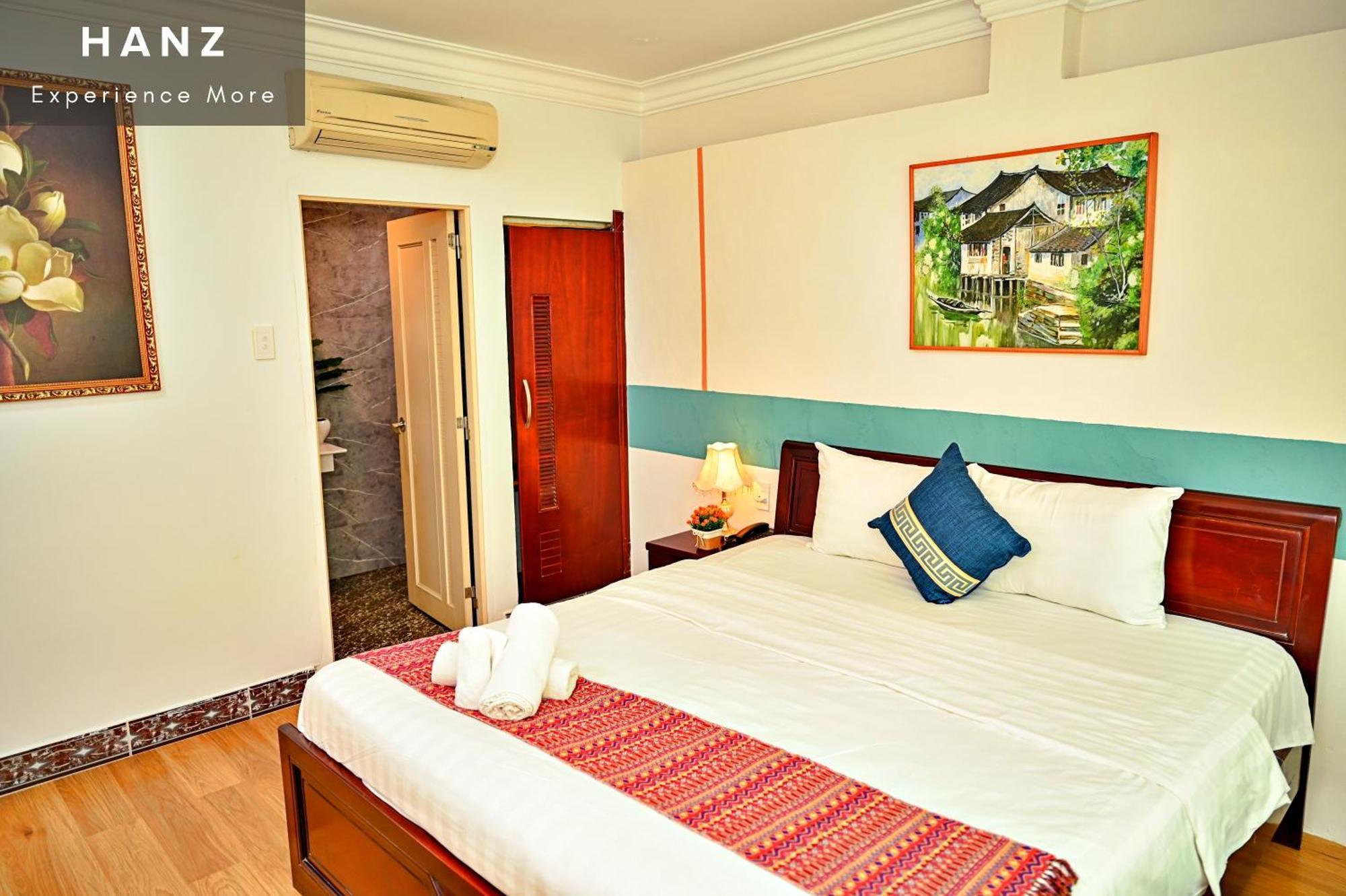 Cosmo Central Hotel Ho Chi Minh-stad Kamer foto
