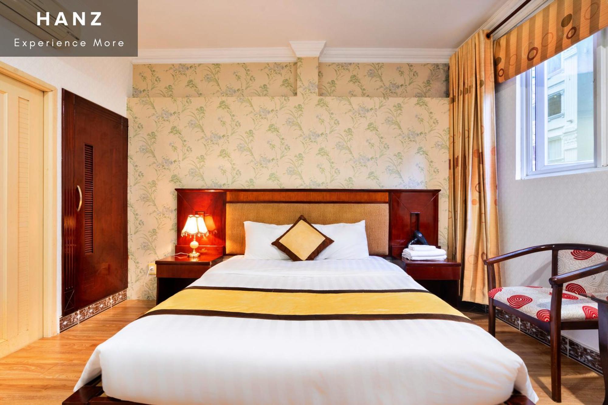 Cosmo Central Hotel Ho Chi Minh-stad Kamer foto