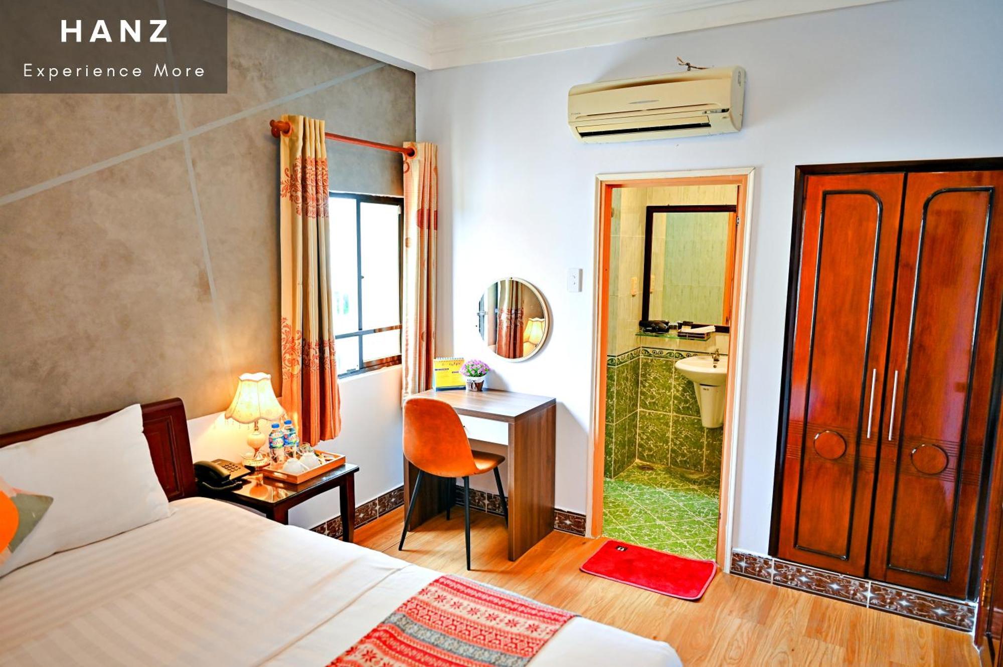 Cosmo Central Hotel Ho Chi Minh-stad Kamer foto